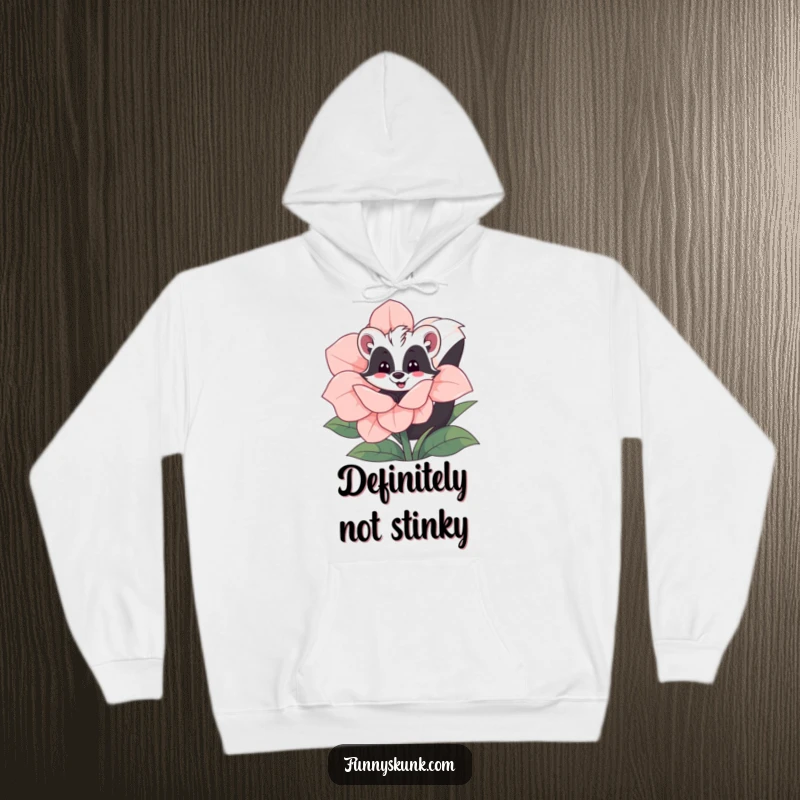 Funny skunk hoodie showing a happy skunk peeking playfully from behind a giant blooming flower, emphasizing warmth and cuteness.