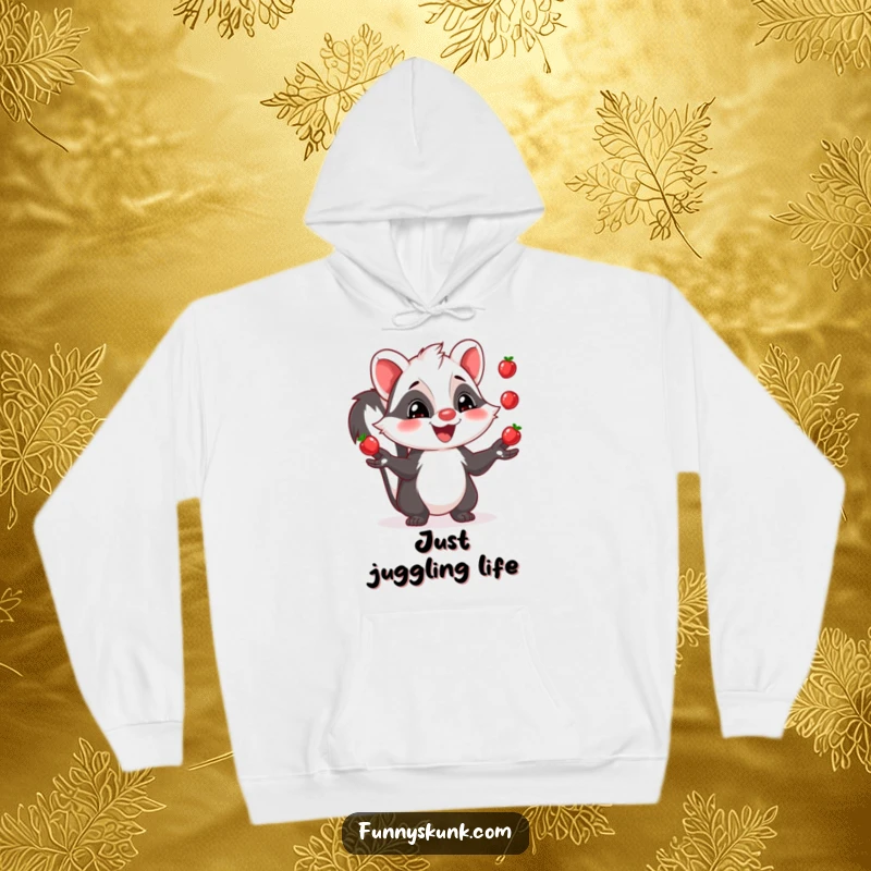 Funny skunk hoodie showing a grinning skunk skillfully juggling three shiny berries, combining comfort and humor.