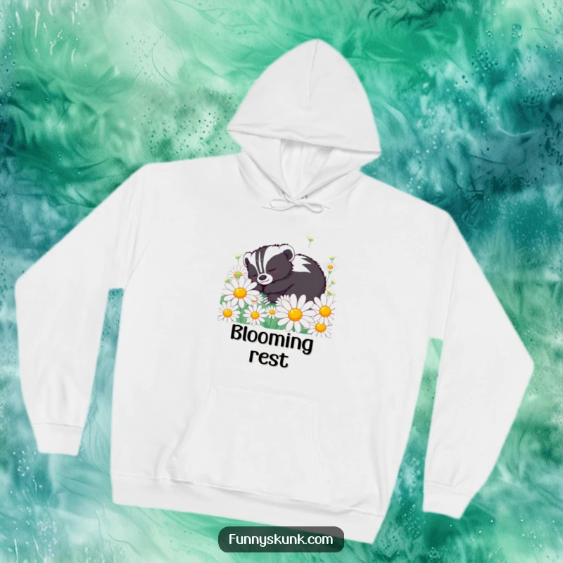 Funny skunk hoodie with a content skunk character peacefully napping amongst oversized daisies, offering cozy floral humor.