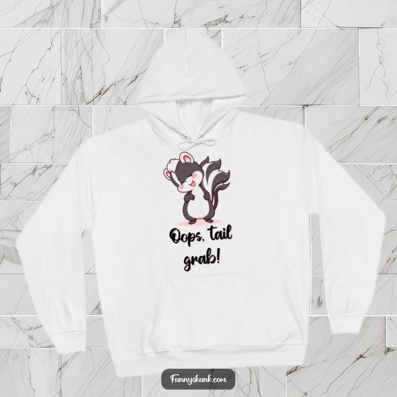 Funny skunk tripping over its tail with a big smile, depicted on a warm, comfortable hoodie for ultimate amusement.