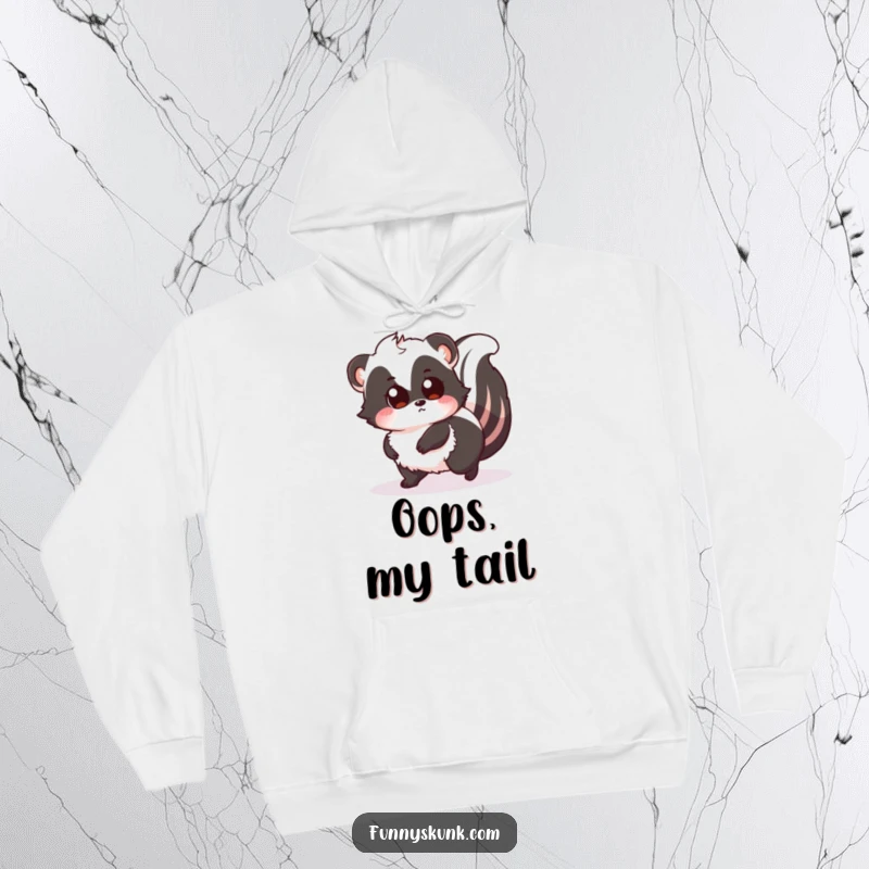 Funny, warm hoodie featuring a fluffy skunk comically tripping over its tail, eyes wide with surprise, offering cozy humor and charm.