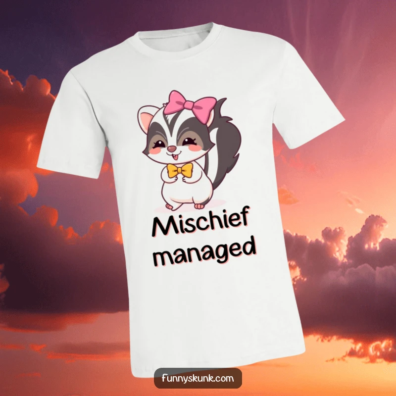 Funny skunk t-shirt featuring a skunk in a bright bow, tiptoeing with mischievous glee, perfect for playful fashion.