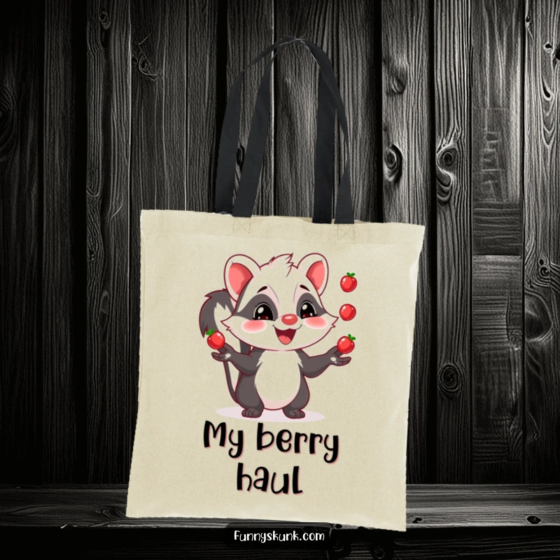 Funny skunk tote bag featuring a grinning skunk juggling three shiny berries, a practical and humorous accessory.