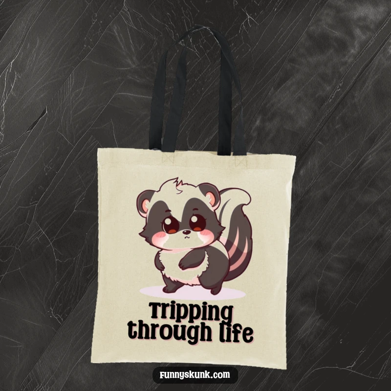 Funny tote bag featuring a fluffy skunk tripping over its tail, eyes wide with surprise, perfect for carrying essentials with a comical touch.